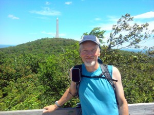 Improvised cell phone holder on pack strap